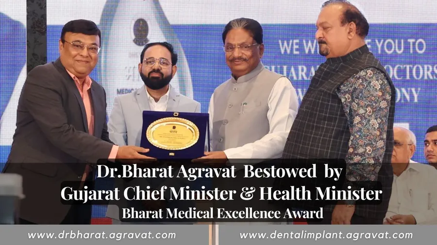 Dr Bharat Agravat receives the Bharat Medical Excellence Award from the Chief Minister of Gujarat